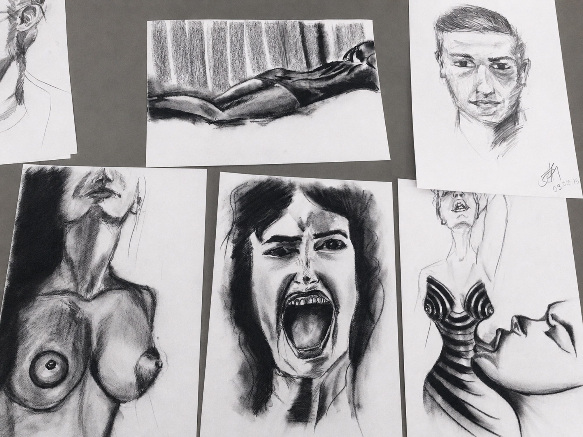Black and white studies of figures and faces
