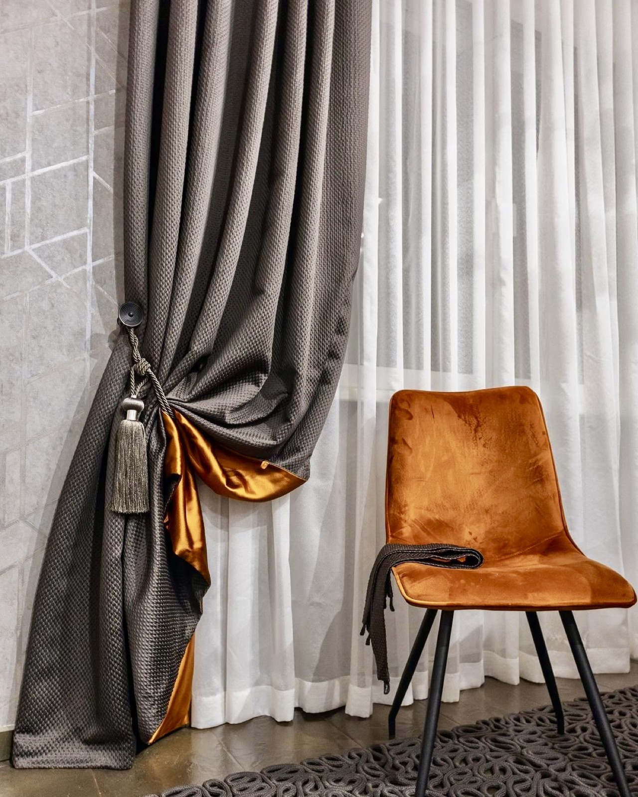 Curtain styling with velvet chair