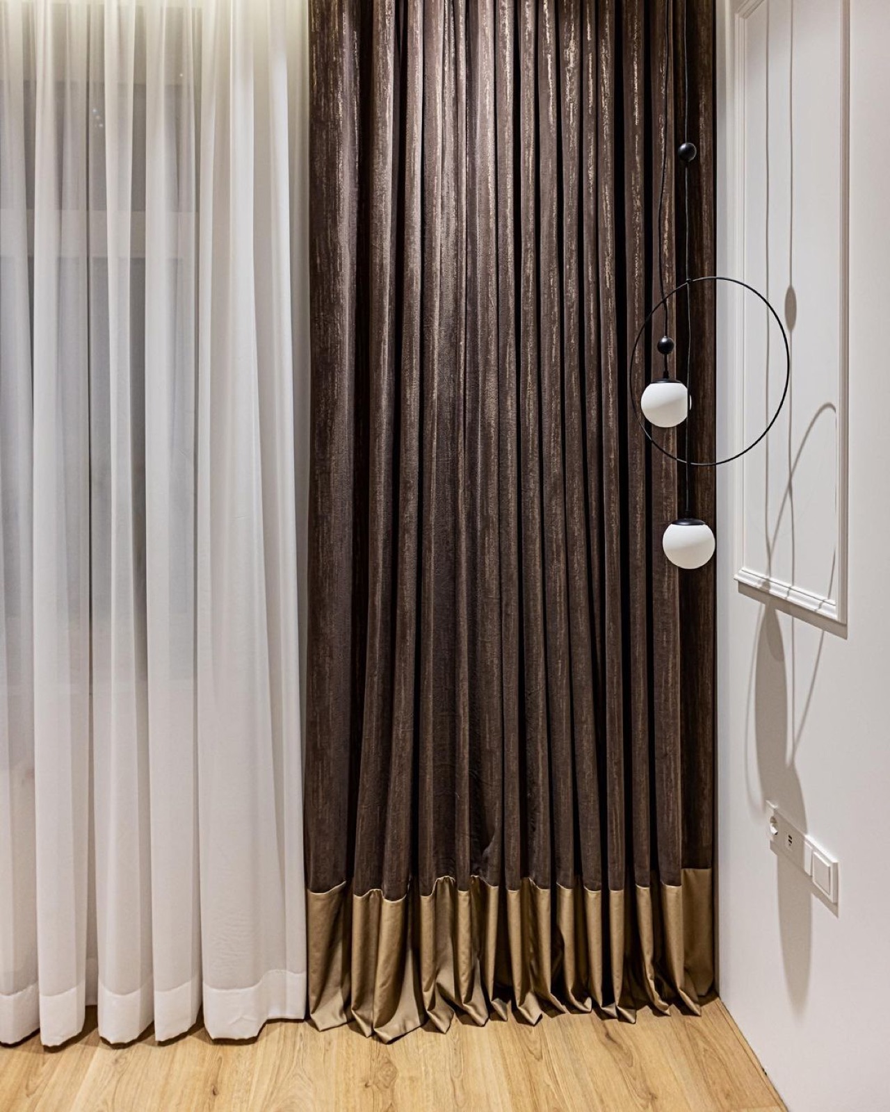 Layered sheer and velvet curtains