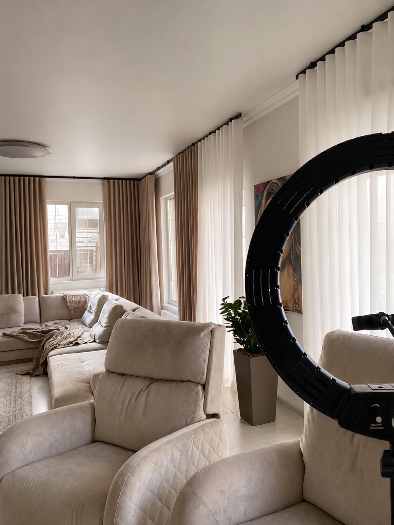 Neutral living room curtain installation